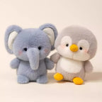 Little Cuddle Buddies mini gray elephant and penguin plush toys together
